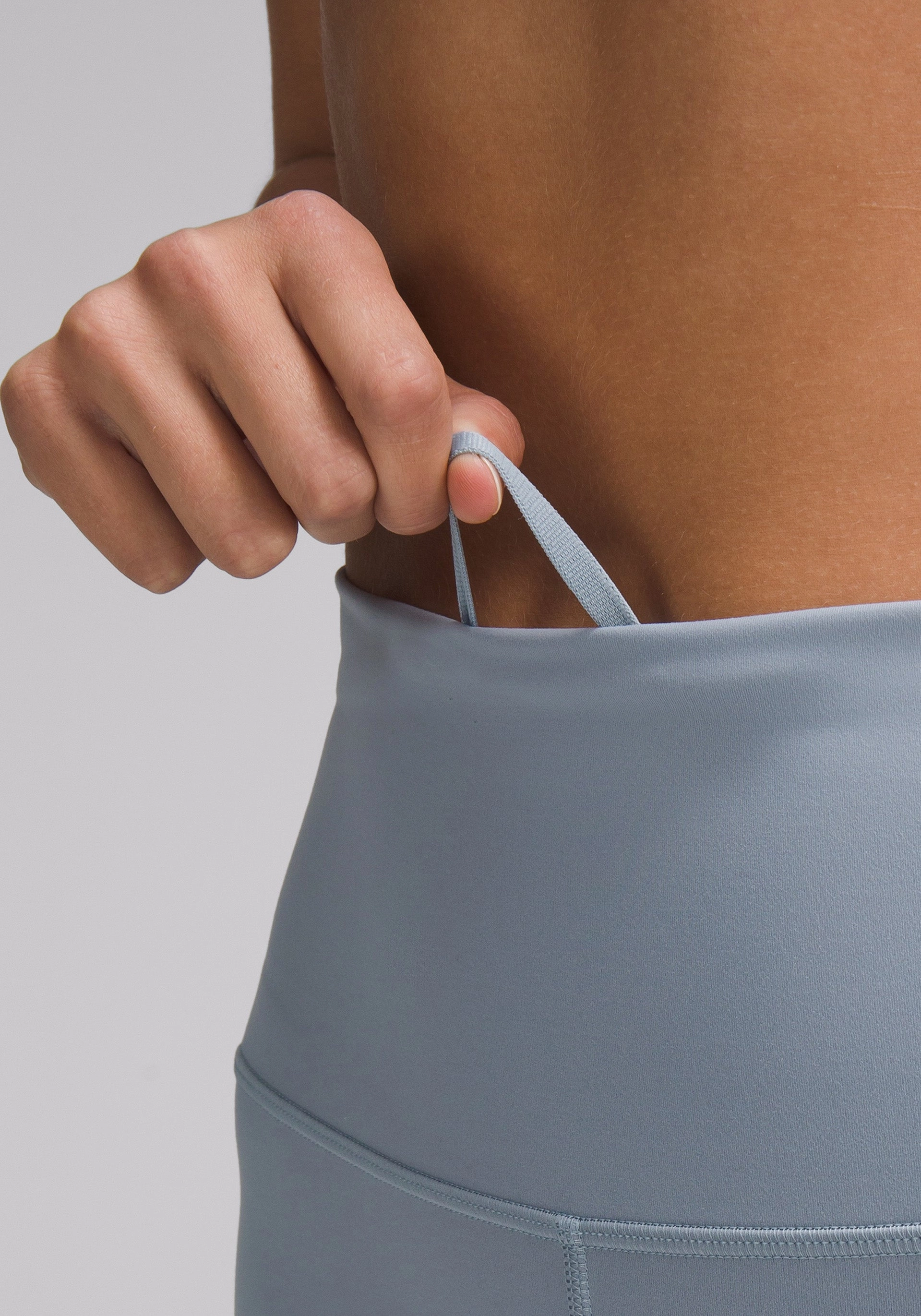 Wunder Train High-Rise Tight with Pockets 25" Ultra Soft Material Non Roll Waistband